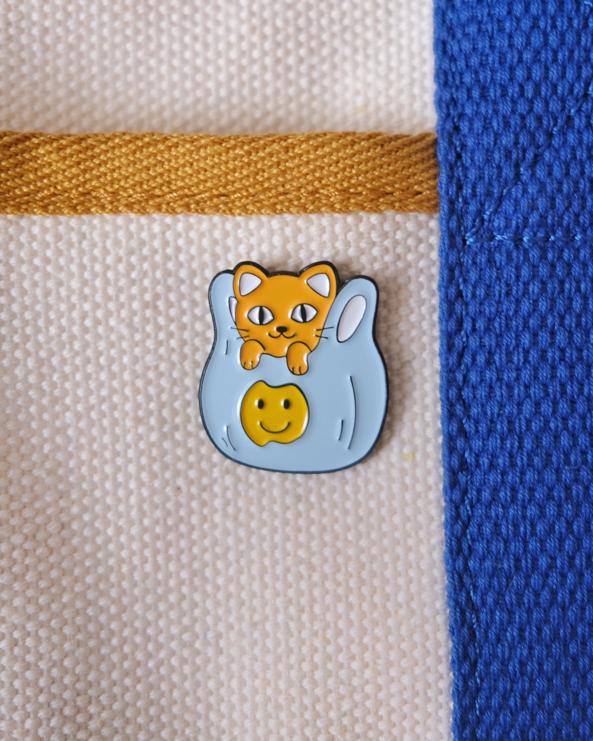 Plastic Bag Cat Enamel Pin.