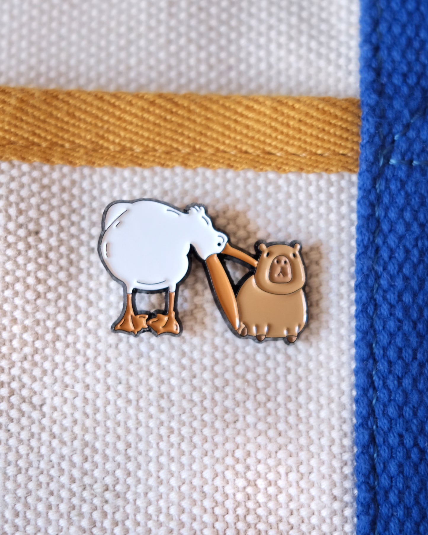 Pelican and Capybara Enamel Pin