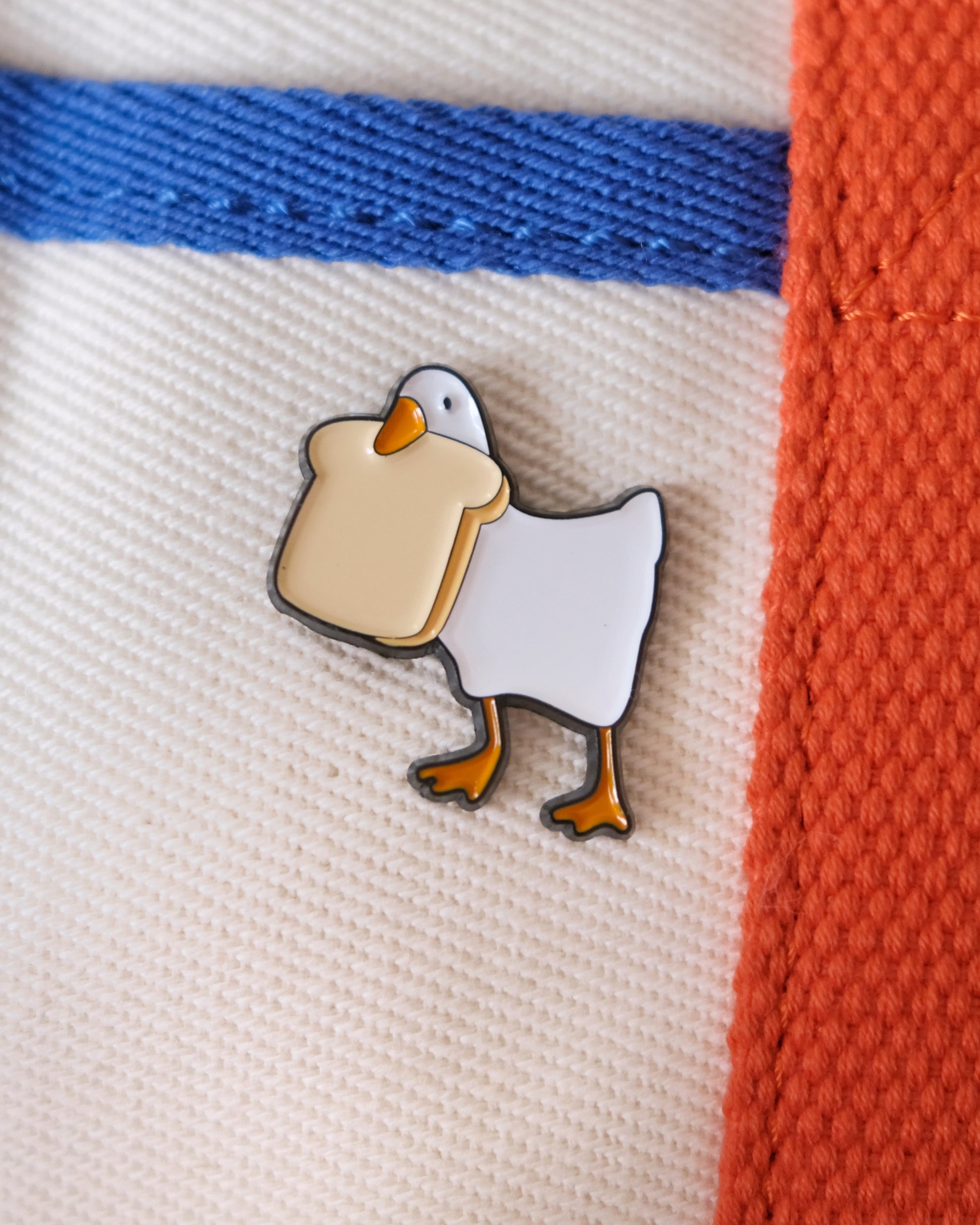 Goose with Bread Enamel Pin Analog Company