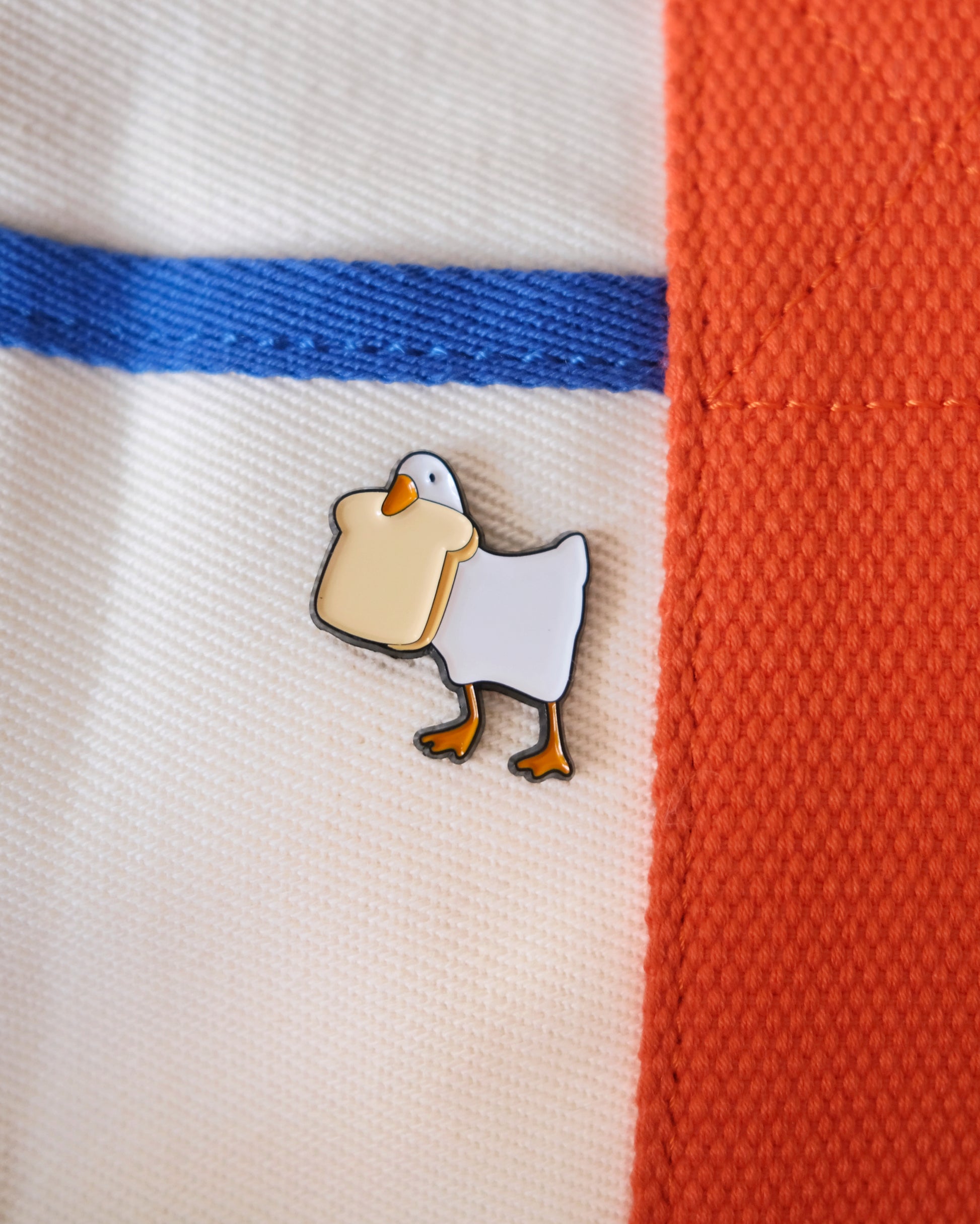 Goose with Bread Enamel Pin Analog Company